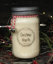 Load image into Gallery viewer, Christmas Hearth soy candle in 16 oz Mason jar, hand poured cotton wick